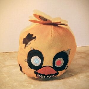 Yellow Plush Toy with Character Face